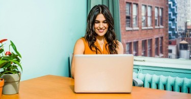 Woman Using Laptop