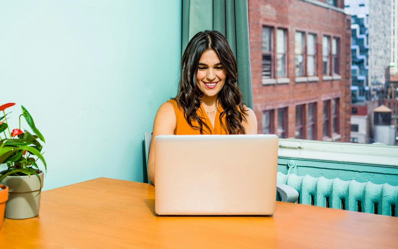 Woman Using Laptop